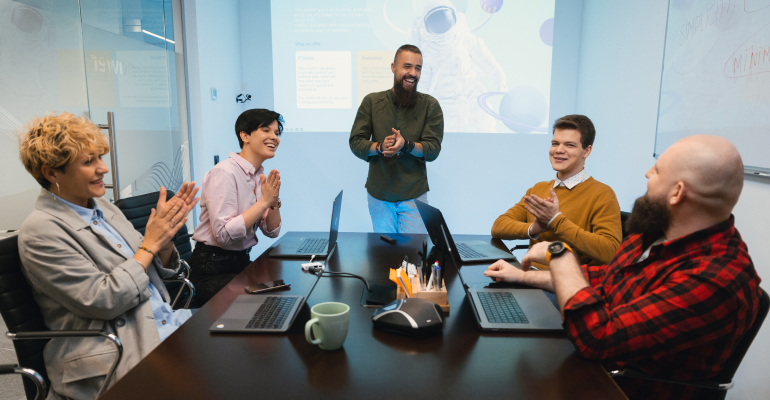 Employees enjoying their team meeting