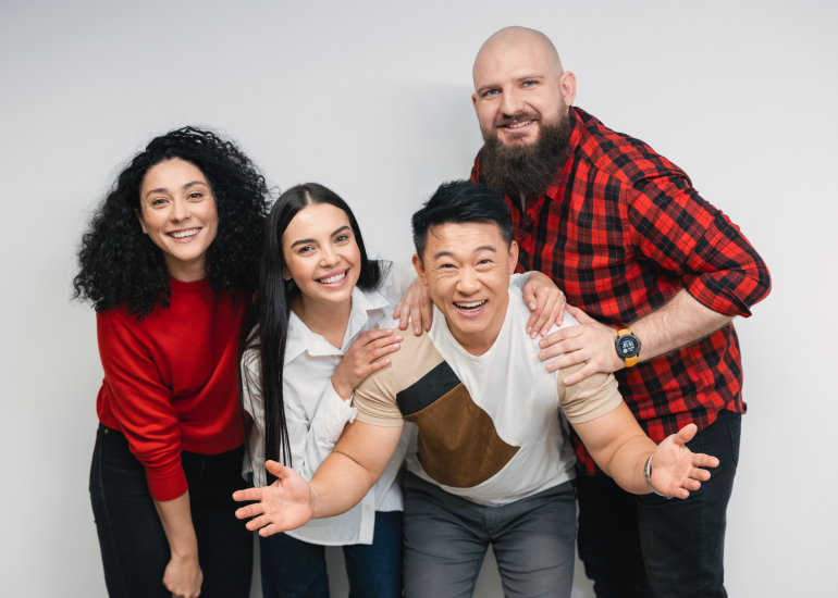 Smiling male and female team members 